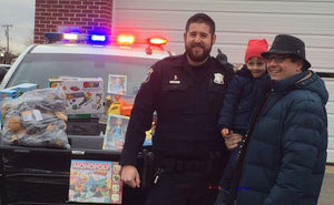 Michigan Officers Stop Cars to Give Children Christmas Eve Gifts